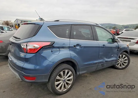 2018 Ford Escape Titanium z USA, uszkodzony, nr VIN 1FMCU0J90JUC09727